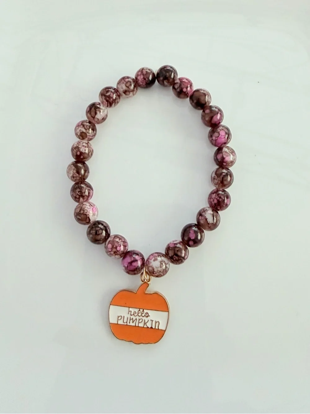 Pink Marbled Bead Bracelet with Orange 'Hello Pumpkin' Charm